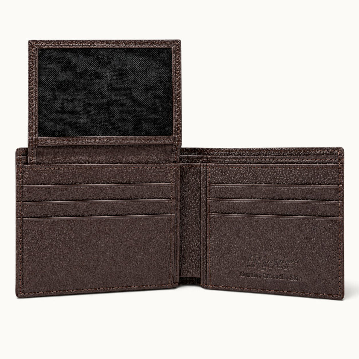 The Ashford brown crocodile bifold wallet with the ID flap fully open, showing card slots, full-grain calf leather interior, mesh window, and embossed RIVER logo.