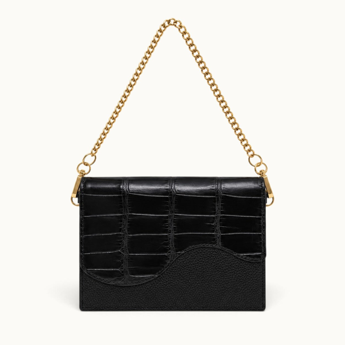 The Berkeley Crocodile Convertible Wallet in Black with genuine Siamese crocodile leather and removable gold-tone chain.