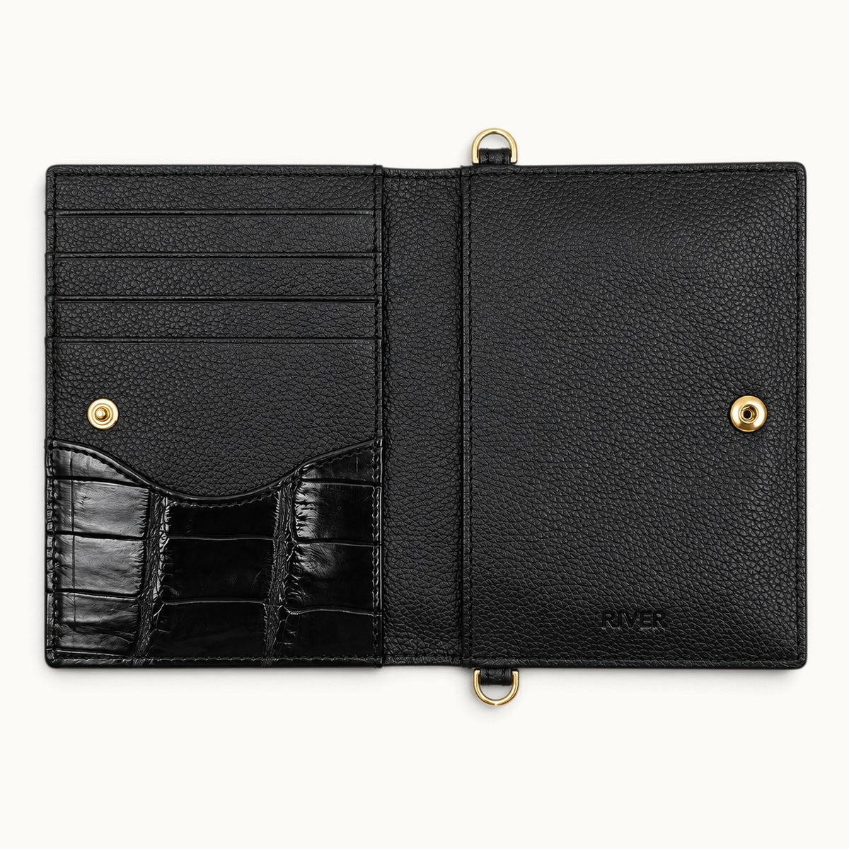 Open interior view of The Berkeley Crocodile Convertible Wallet in Black with soft pebbled calf leather, crocodile detailing, card slots, and gold-tone snap closure.