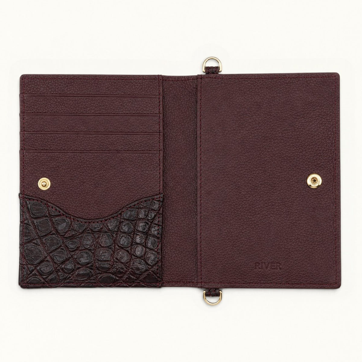 Open interior view of The Berkeley Crocodile Convertible Wallet in Bordeaux with pebbled calf leather, crocodile pocket, card slots, and gold-tone hardware.