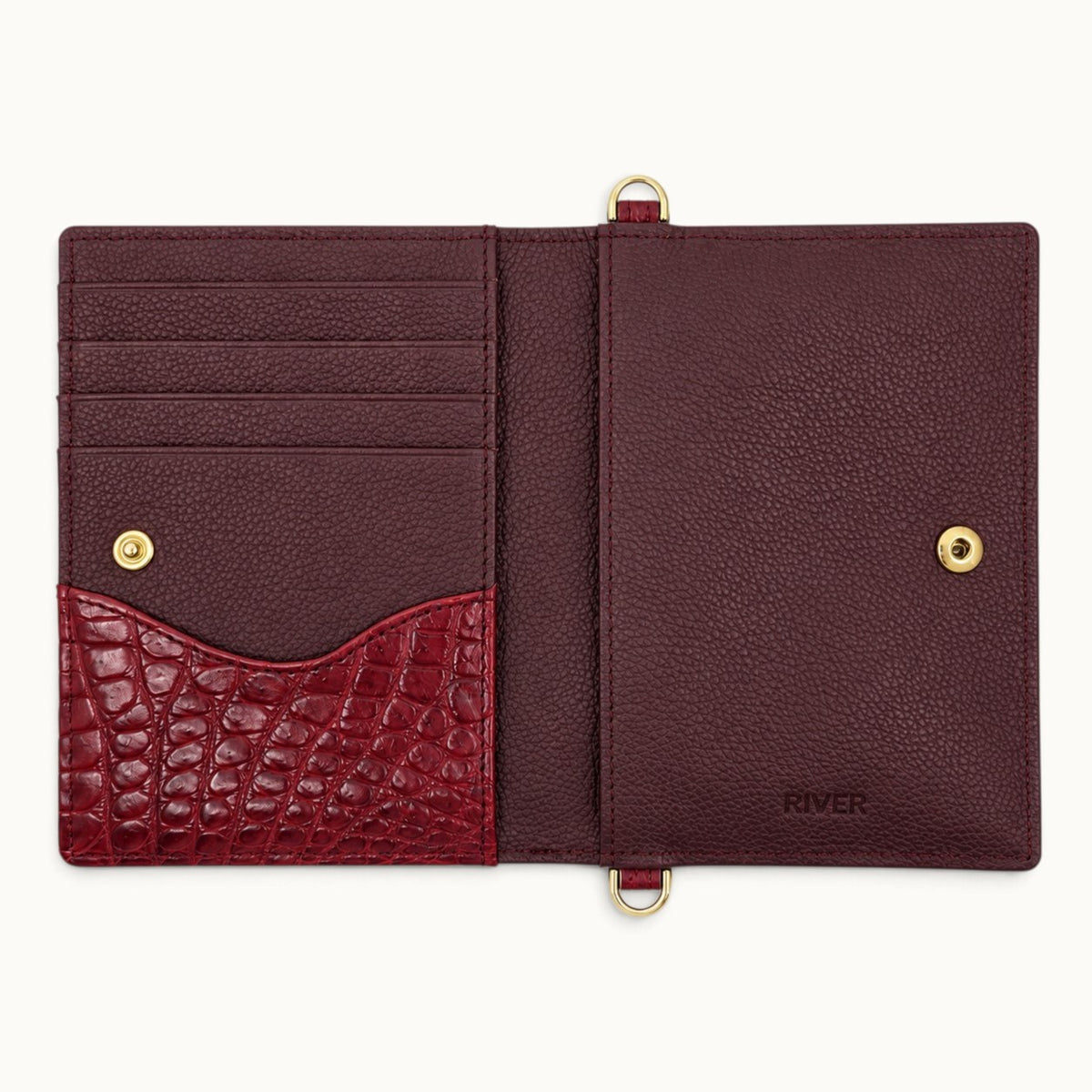 Open interior view of The Berkeley Crocodile Convertible Wallet in Burgundy with pebbled calf leather, crocodile pocket, card slots, and gold-tone snap closure.