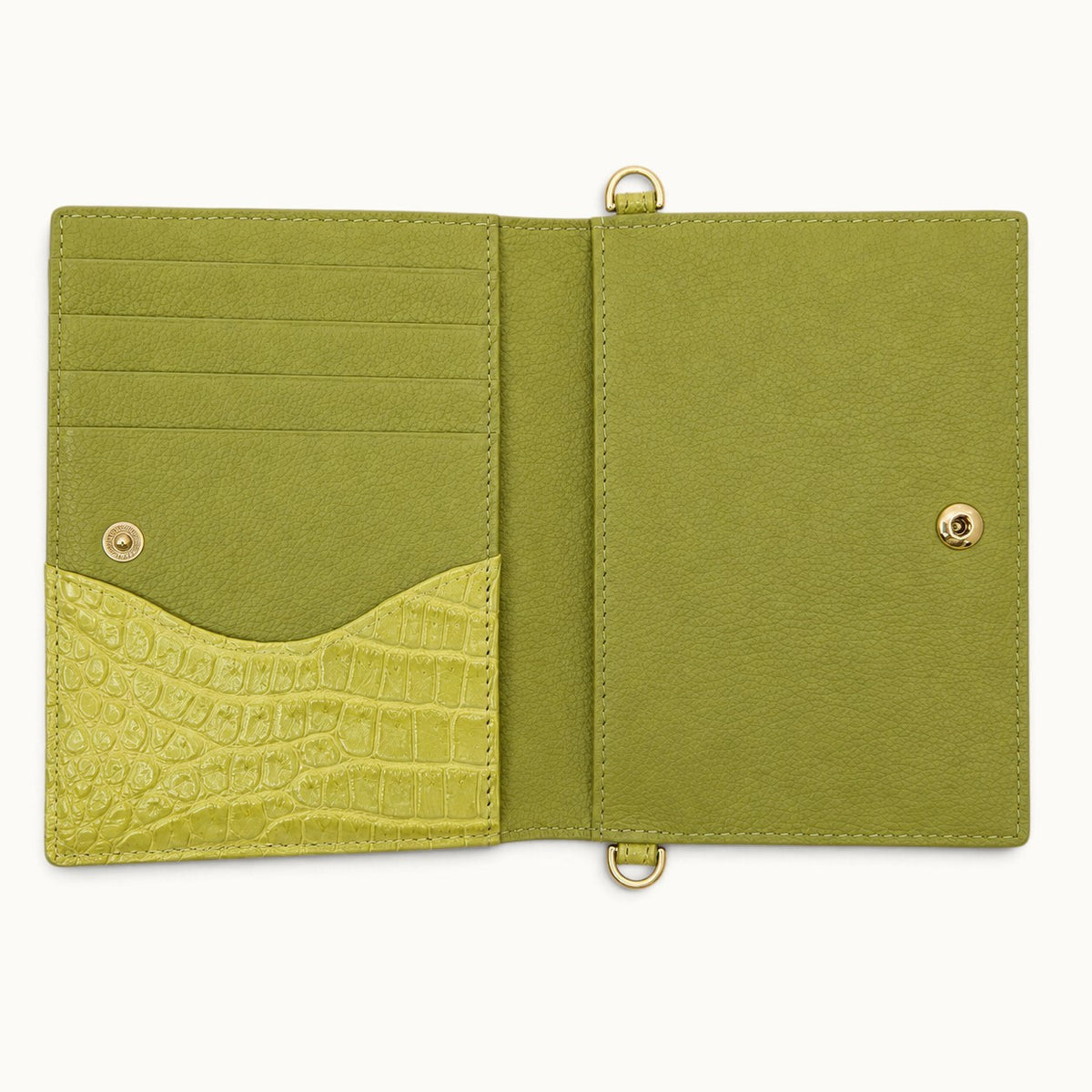 Open interior view of The Berkeley Crocodile Convertible Wallet in Lime Green with soft pebbled calf leather, crocodile pocket, card slots, and gold-tone snap closure.