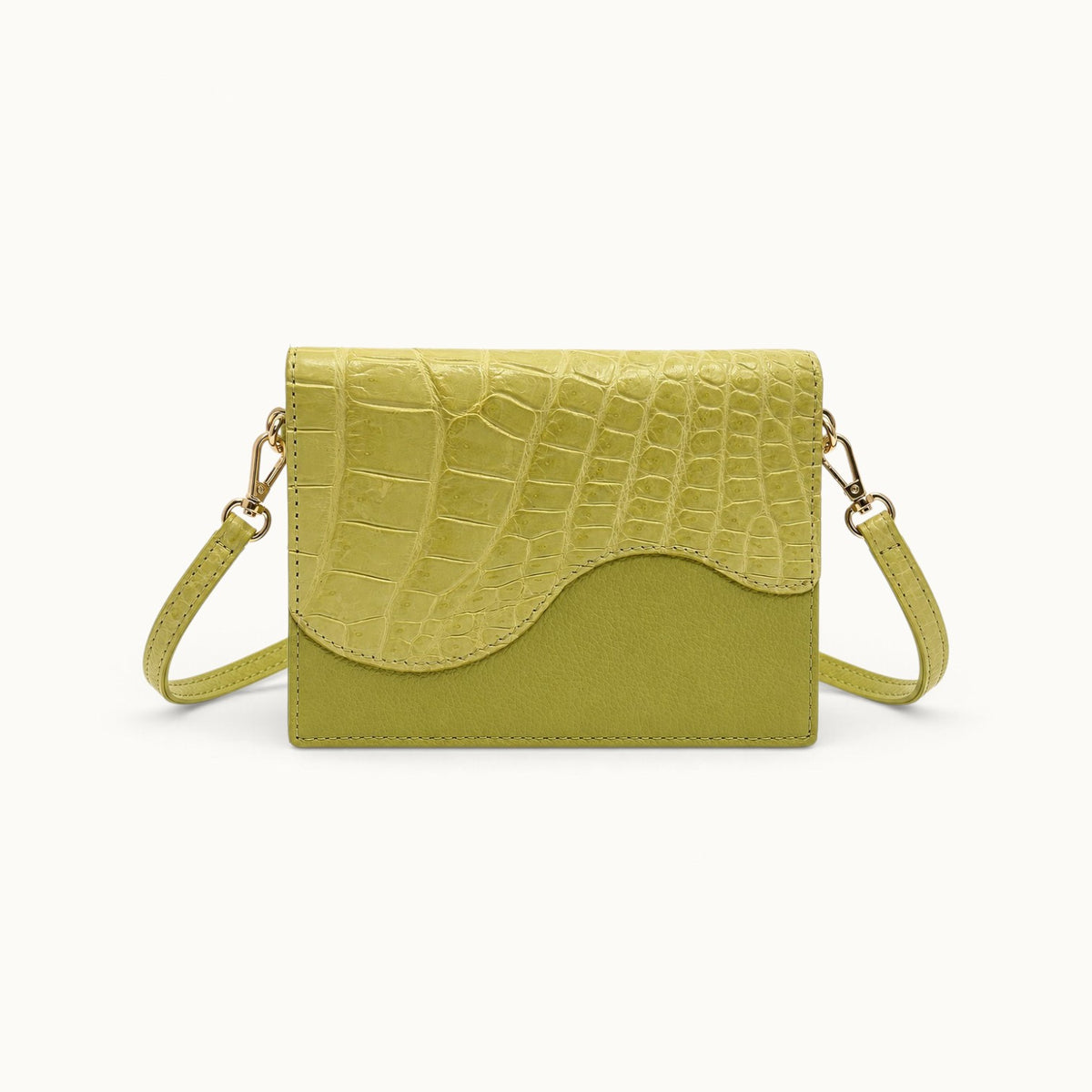 The Berkeley Crocodile Convertible Wallet in Lime Green with a removable crocodile leather shoulder strap and slim convertible design.