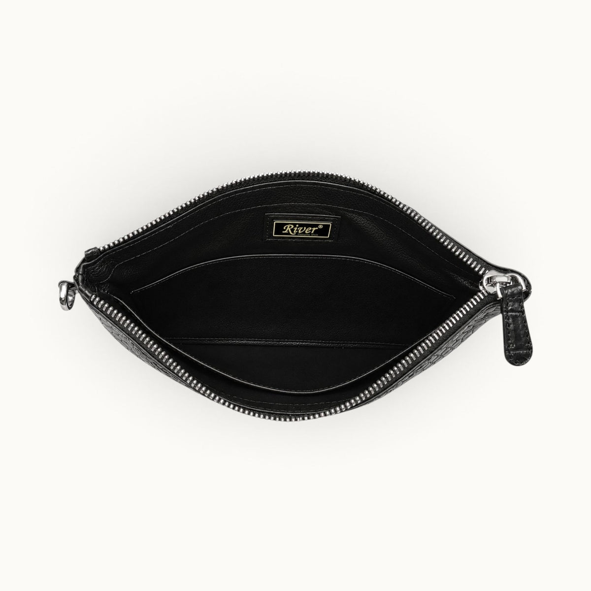Black exotic leather clutch with coordinating full-grain leather interior and slip compartment