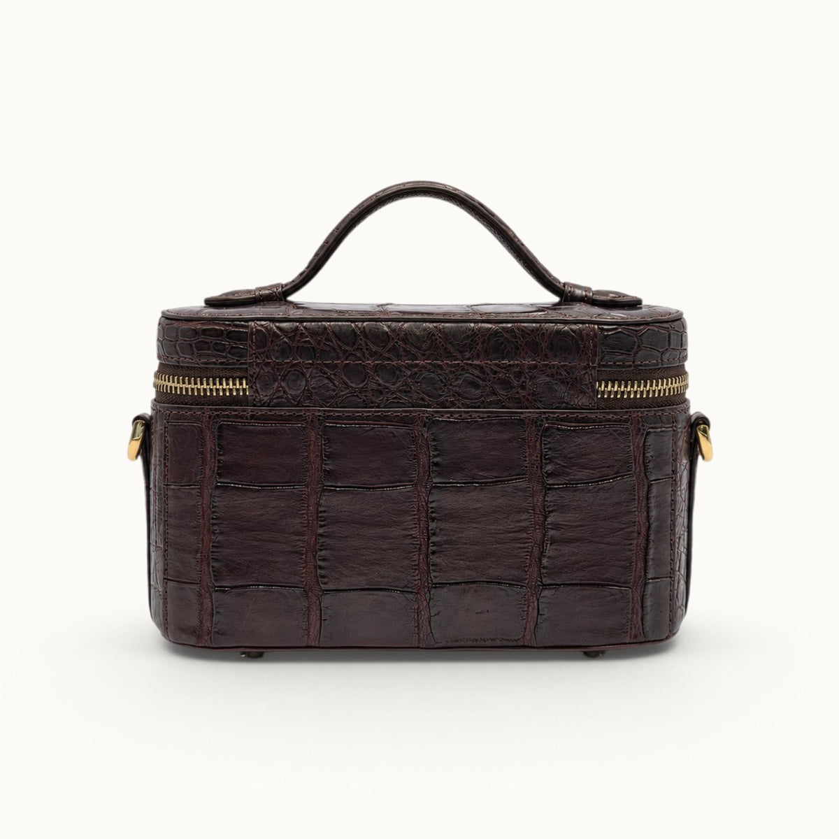 Back view of The Clarendon Bordeaux Siamese crocodile leather handbag showing the rich natural scale pattern.