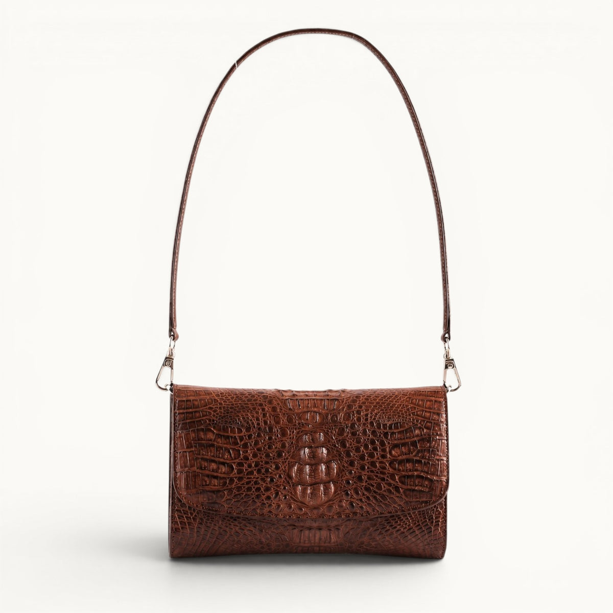 Full front view of The Cavendish genuine caiman leather shoulder clutch bag in rich brown with detachable strap and polished silver-tone hardware.