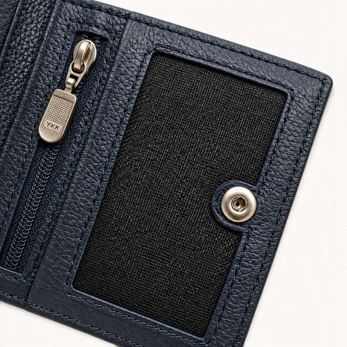 Deep Navy Compact Crocodile Wallet interior detail showing the YKK zip pocket, mesh ID window and silver-tone hardware