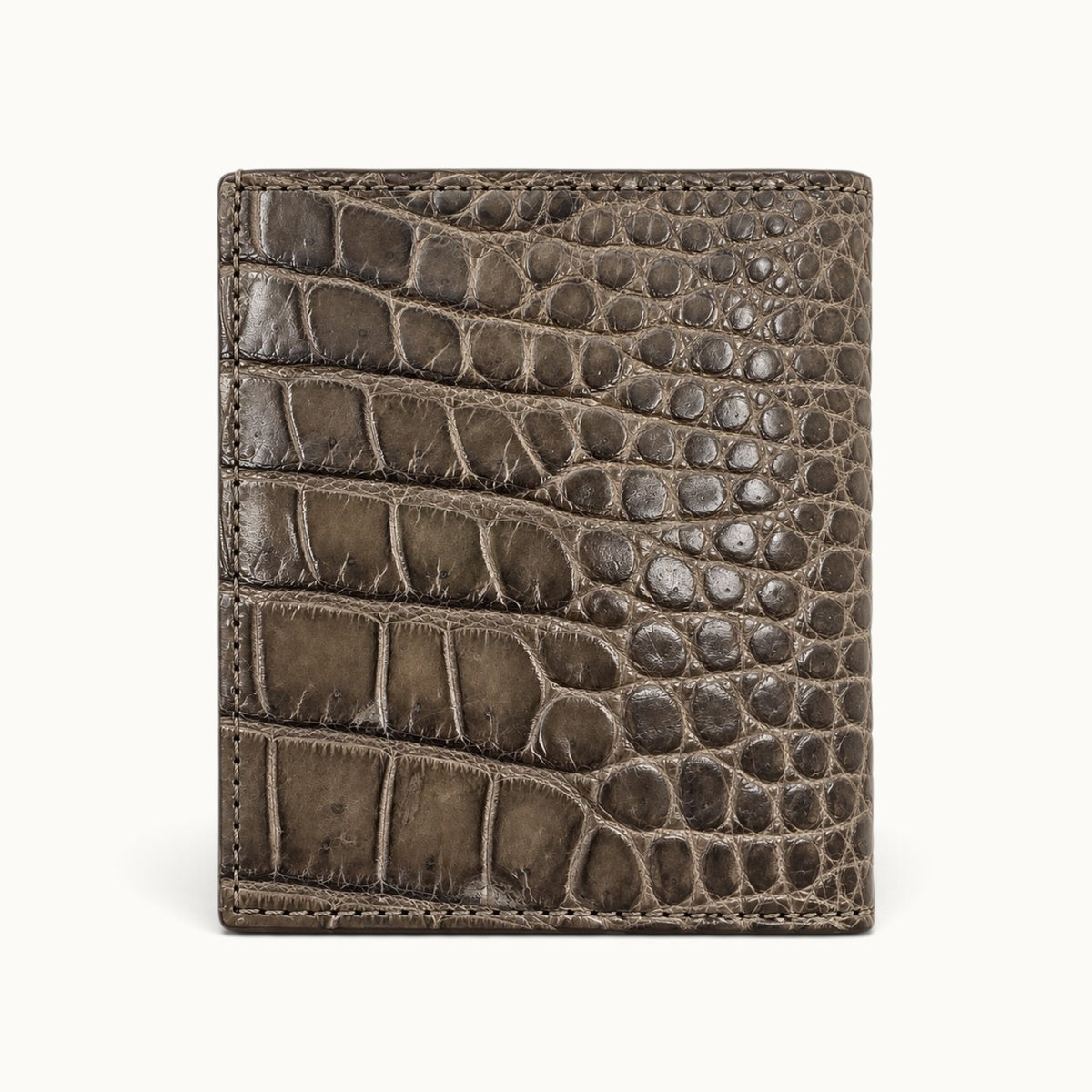 The Compact Crocodile Wallet in Taupe Green showing the natural Siamese crocodile scale pattern across the back exterior