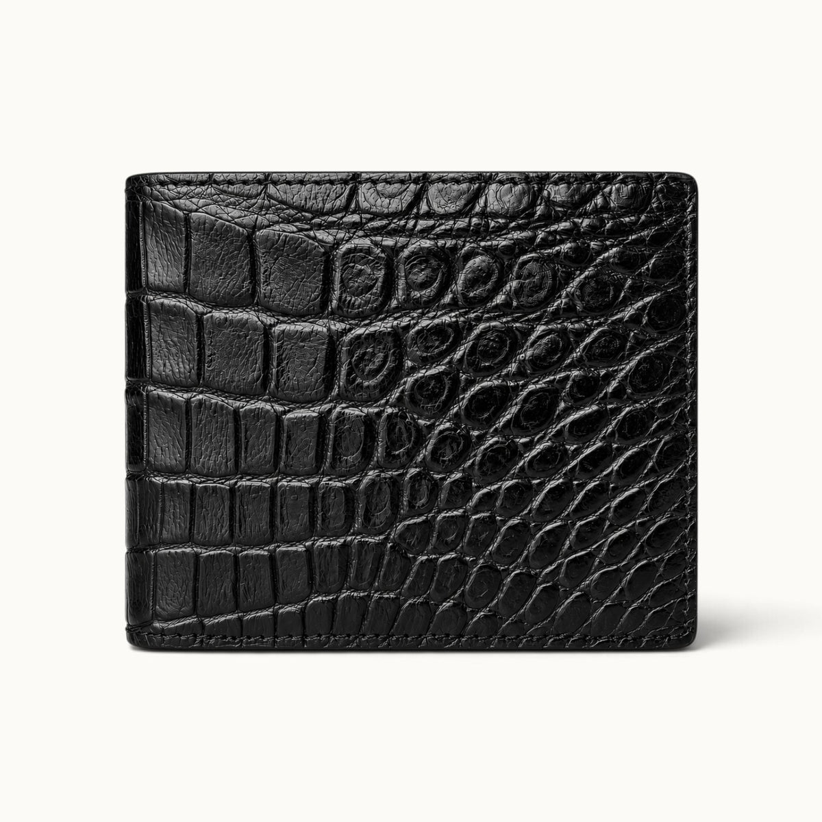 Front view of The Ashford black Siamese crocodile leather bifold wallet with a full-belly exterior and natural luxury scale pattern.