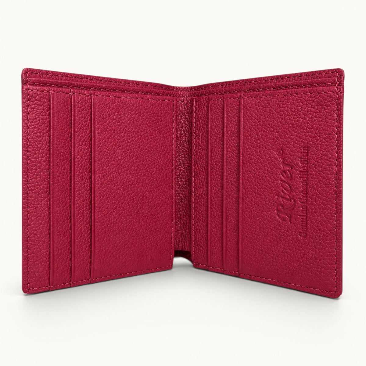 Herrington Bright Pink crocodile trifold wallet open to reveal a full-grain cow leather interior with six card slots and dual cash compartments.