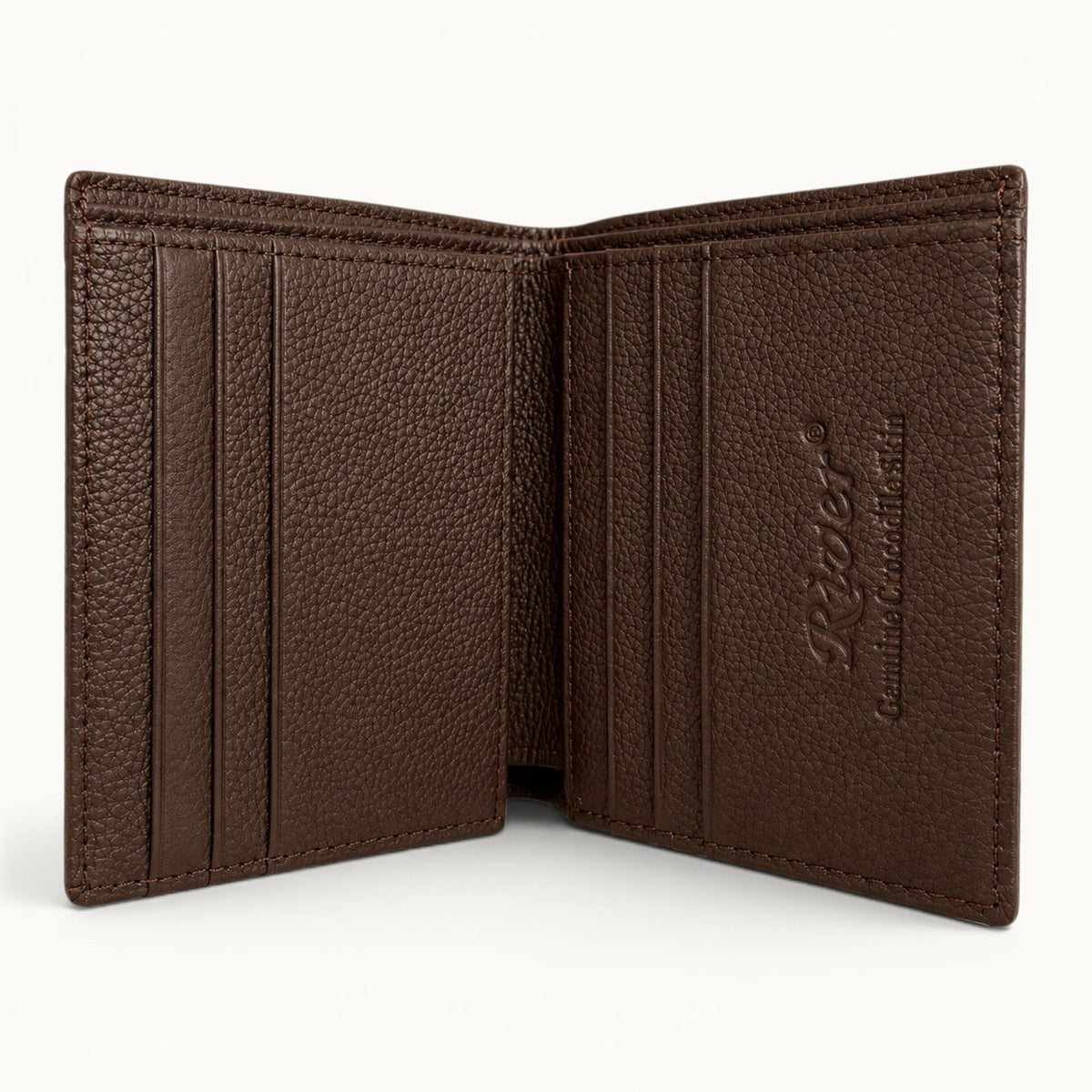 Herrington Espresso Brown crocodile trifold wallet open to show its full-grain cow leather interior, six card slots, dual cash compartments, and embossed River branding.