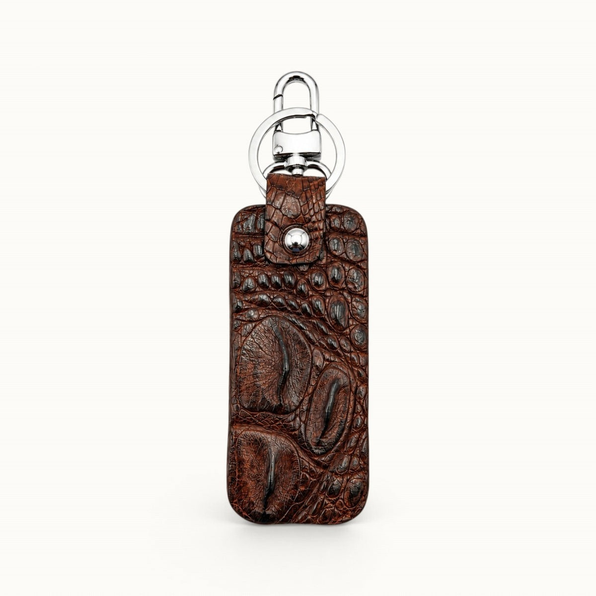 Back view of the Kensington brown alligator leather key fob showing the natural scale pattern, polished silver clasp, and large key ring.