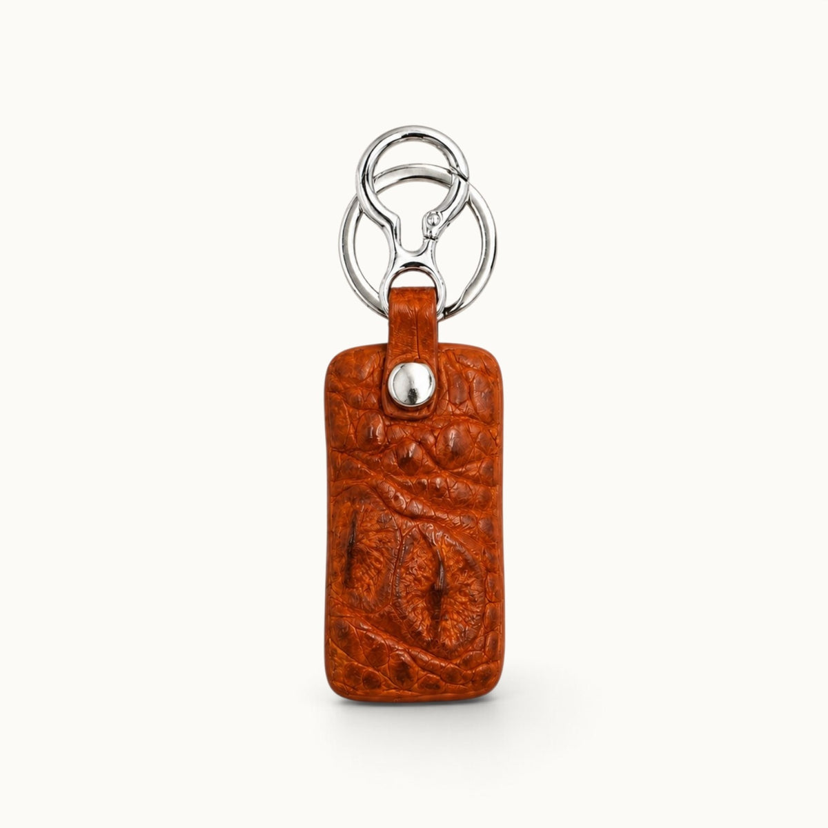 Front view of the Kensington Cognac Tan genuine alligator leather key fob with polished silver-tone rings and clasp.