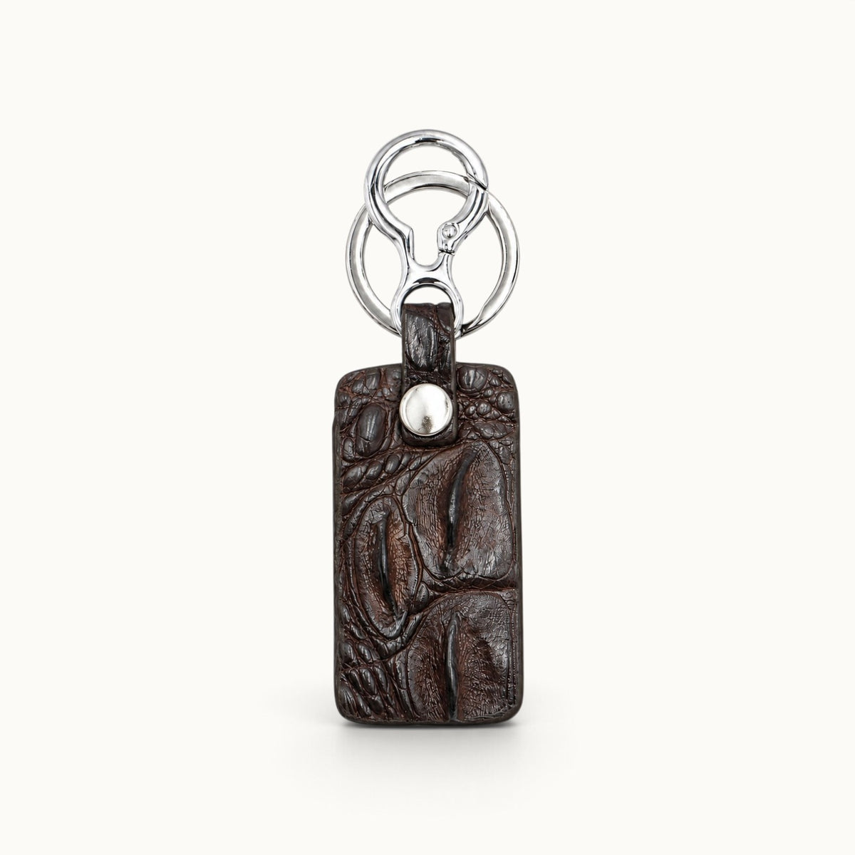 Front view of the Kensington Espresso Brown genuine alligator leather key fob with polished silver-tone rings and clasp.