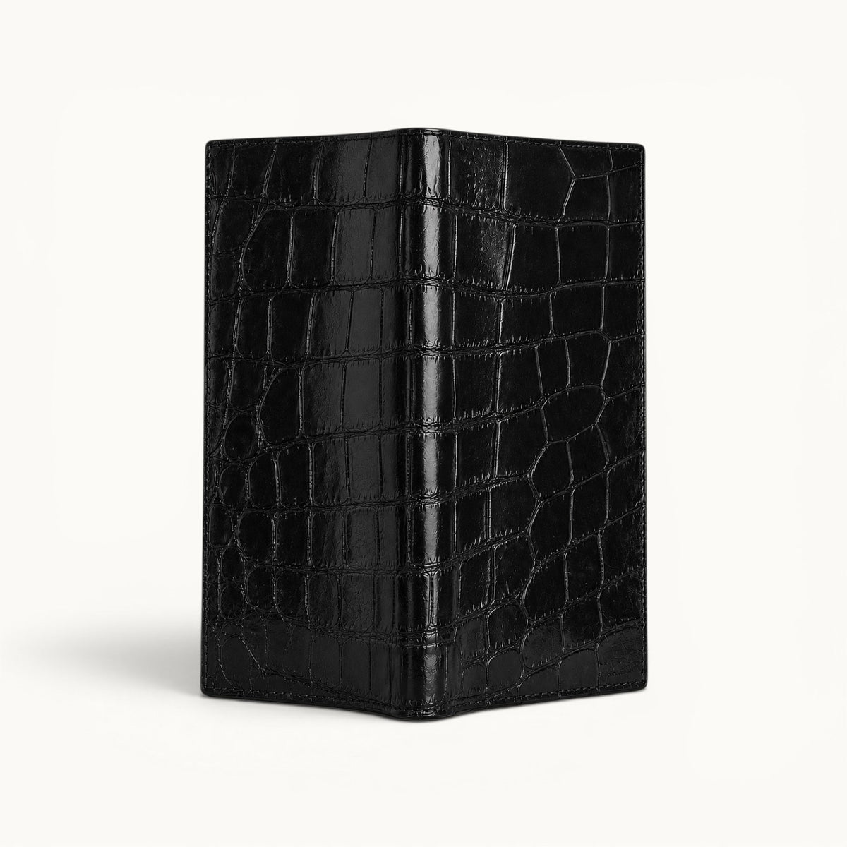 Back exterior view of The Kingsley Crocodile Long Wallet in black crocodile leather.