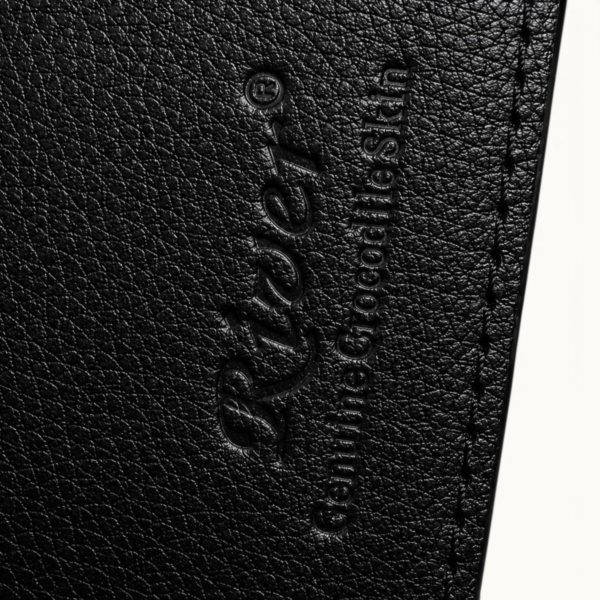 Embossed River logo detail inside The Kingsley Crocodile Long Wallet.