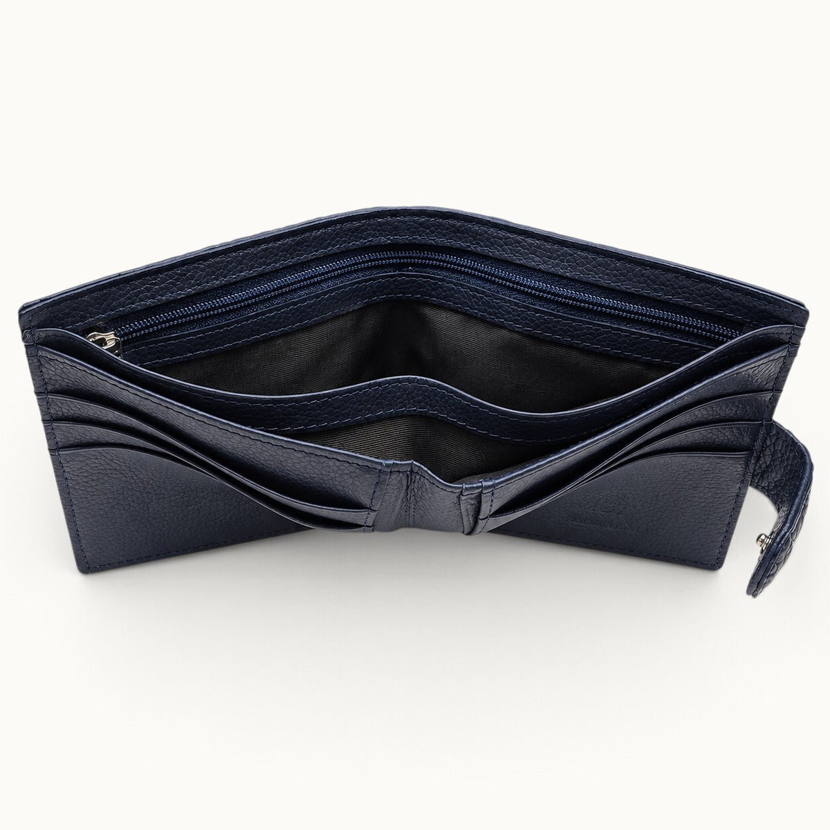Deep navy Langham crocodile wallet open interior showing bill compartments and full-length zip compartment