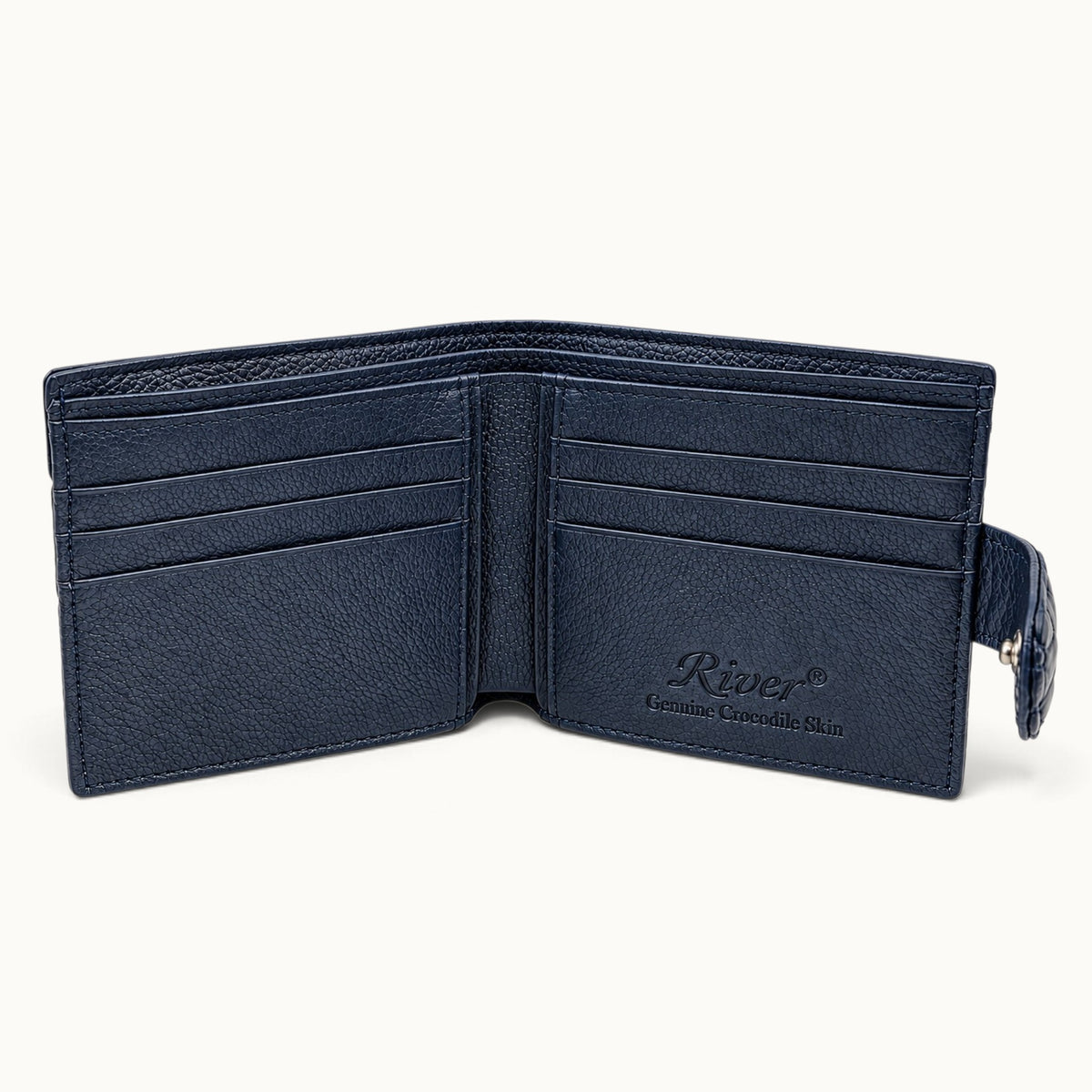 Open deep navy Langham crocodile wallet showing six card slots and embossed River logo