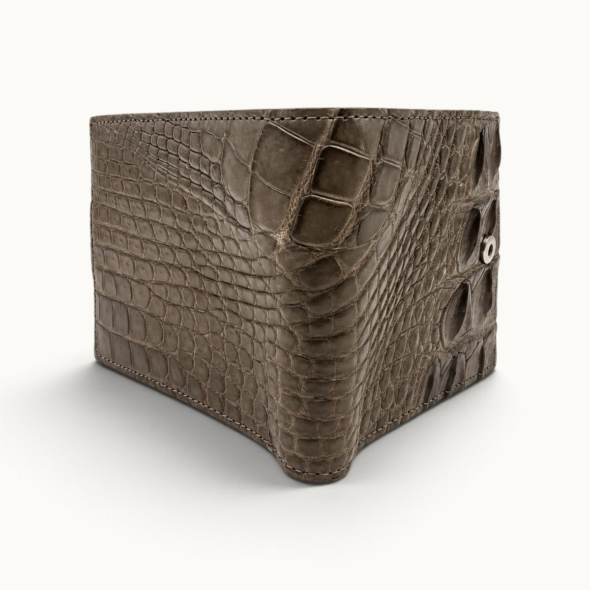 Taupe green Langham crocodile wallet shown from the back at an angle with crocodile texture and snap hardware