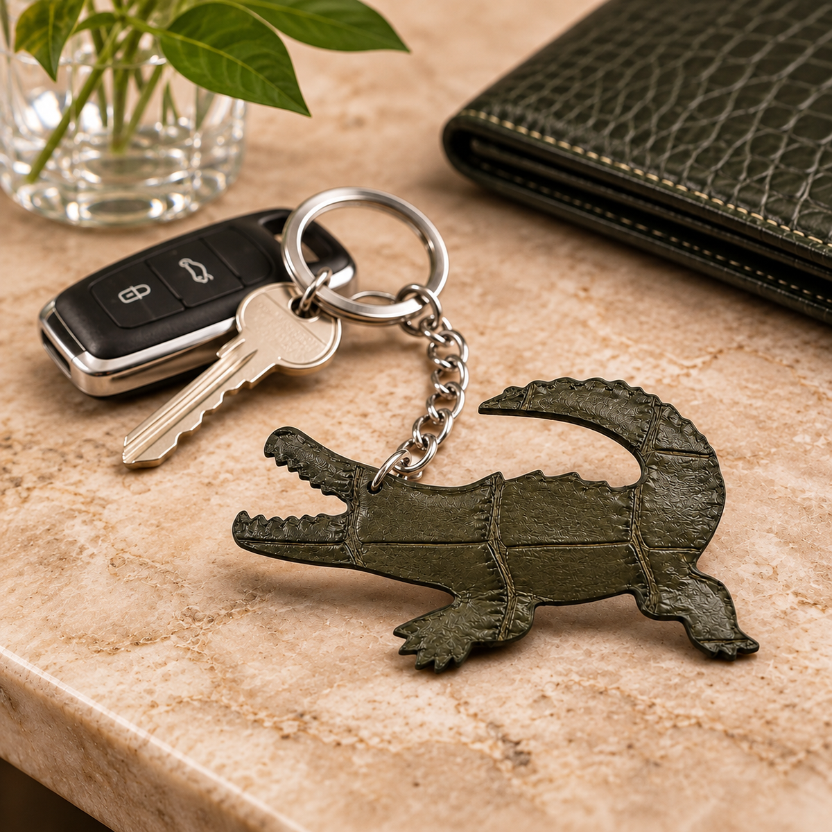 Smoky olive Siamese crocodile leather key charm styled with keys, car fob, and green leather wallet
