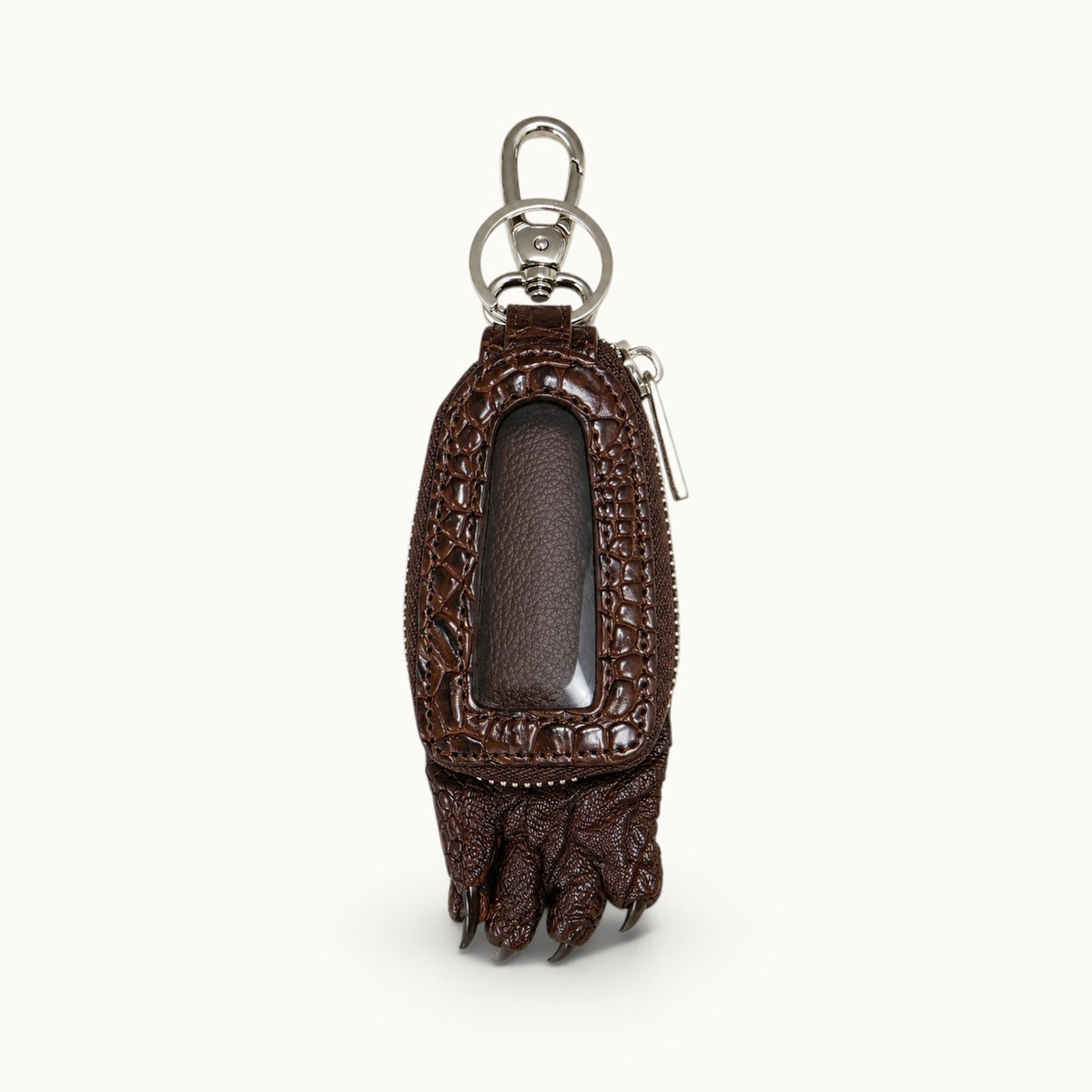 Brown Siamensis crocodile leather car key case shown from the front with an empty clear window, silver hardware, and sculpted claw detail.