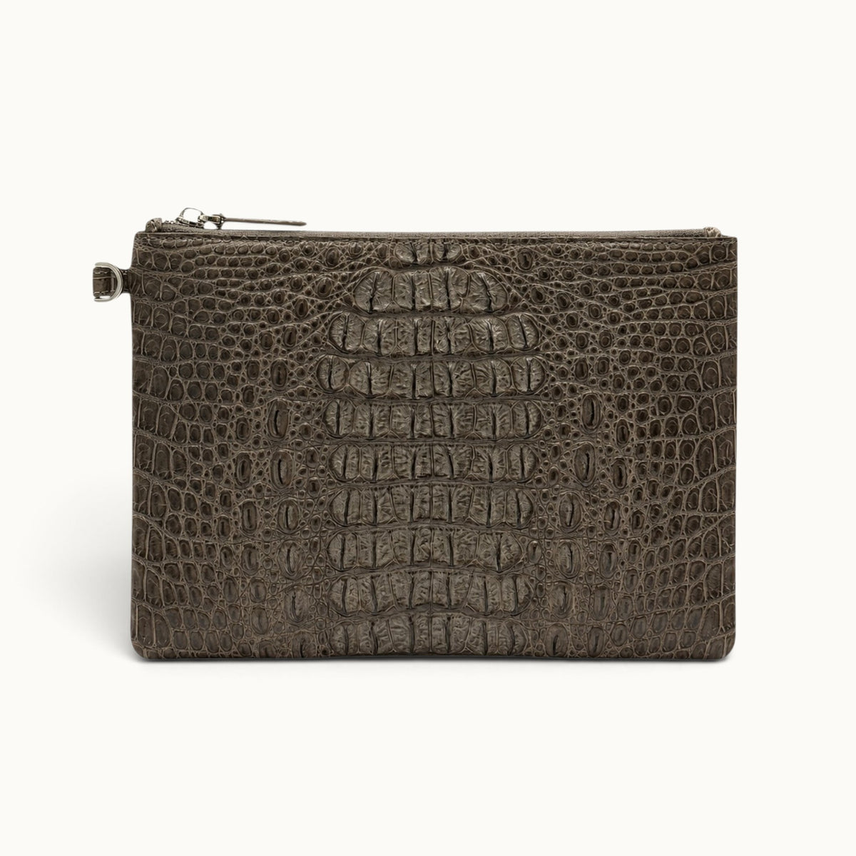 Taupe green crocodile leather clutch with muted natural color and distinctive scale pattern