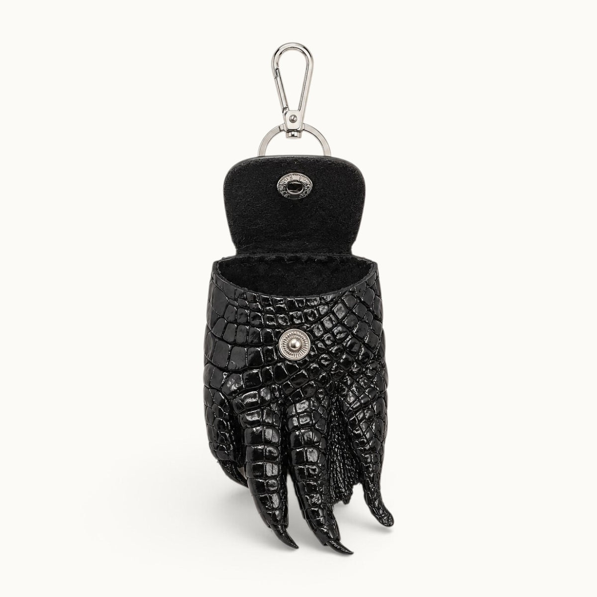 The Claw Crocodile Coin Pouch open from the front, showing the raw leather interior and snap closure