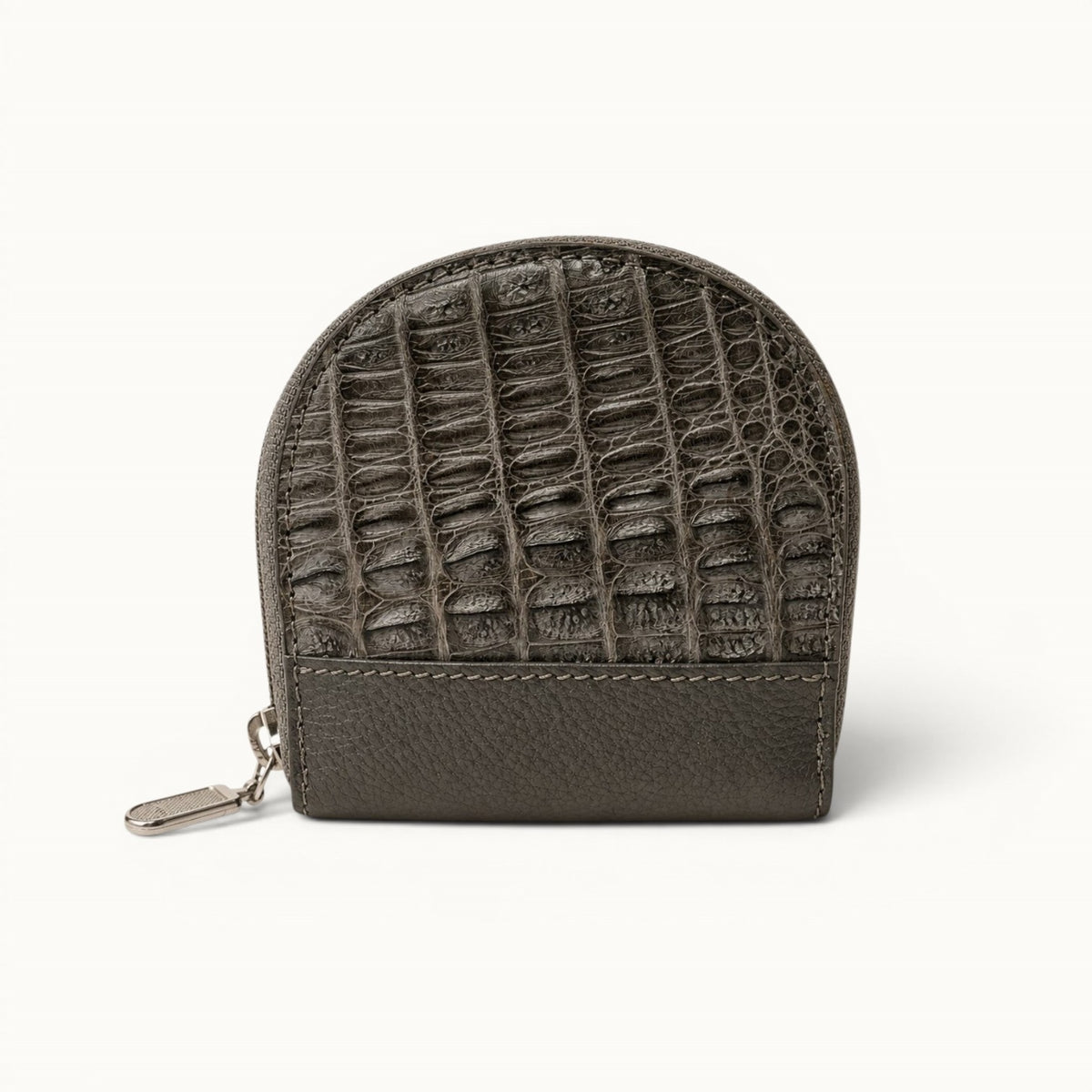 Front view of The Sovereign gray crocodile leather coin pouch with a pebbled leather base and silver-tone zip closure.