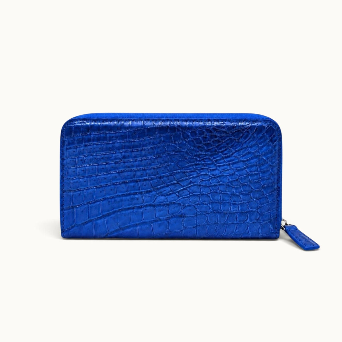 Back view of the Belvedere Siamese crocodile zip-around wallet in Royal Blue showing the natural crocodile scale pattern