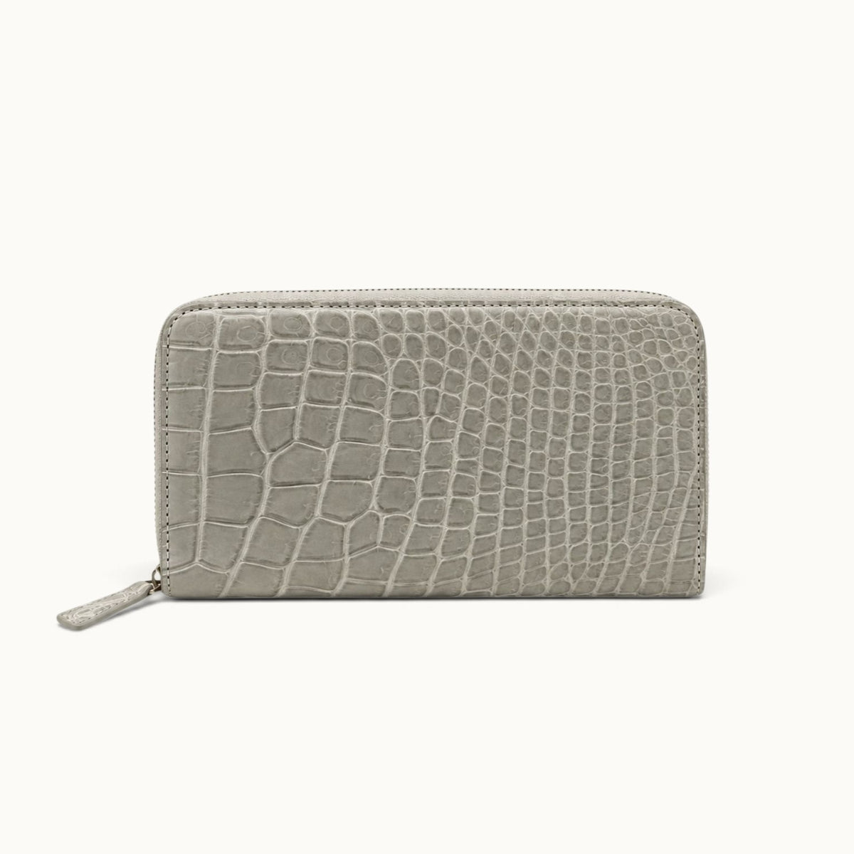 Back view of the Belvedere Siamese crocodile zip-around wallet in Stone Gray showing the natural crocodile scale pattern