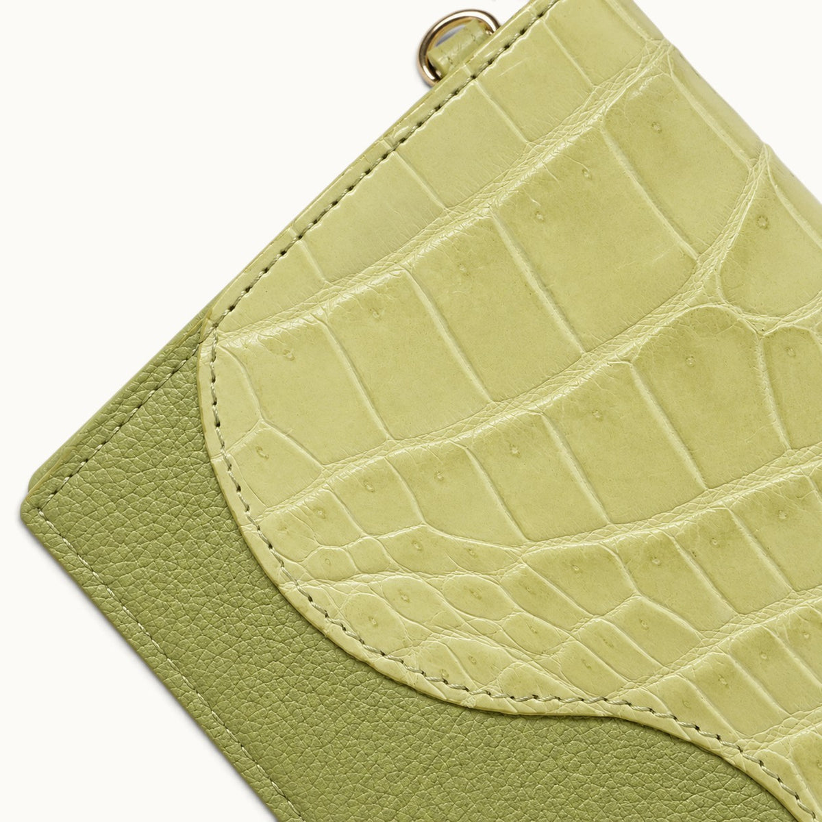 Close-up texture detail of The Berkeley Crocodile Convertible Wallet in Lime Green showing genuine Siamese crocodile scales, pebbled calf leather, and precise stitching.