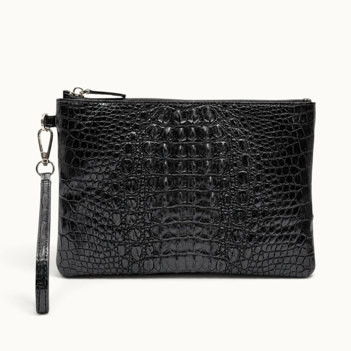 Black crocodile wristlet clutch with detachable leather strap and polished silver-tone clasp