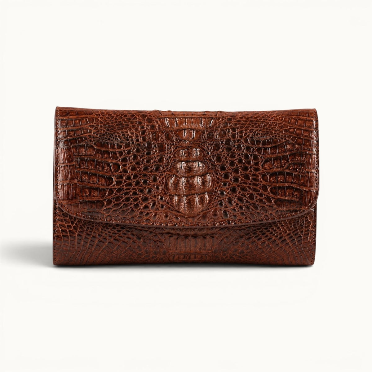 Front view of The Cavendish genuine caiman crocodile leather shoulder clutch bag in rich brown with a natural scale pattern.