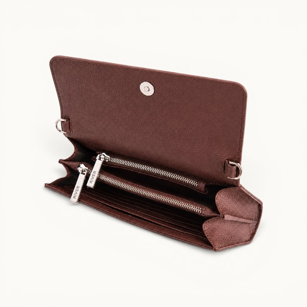 Interior view of The Cavendish genuine caiman leather shoulder clutch bag, showing six card slots, two zippered compartments, pebbled full-grain cow leather, magnetic closure, and RIVER zipper pulls.