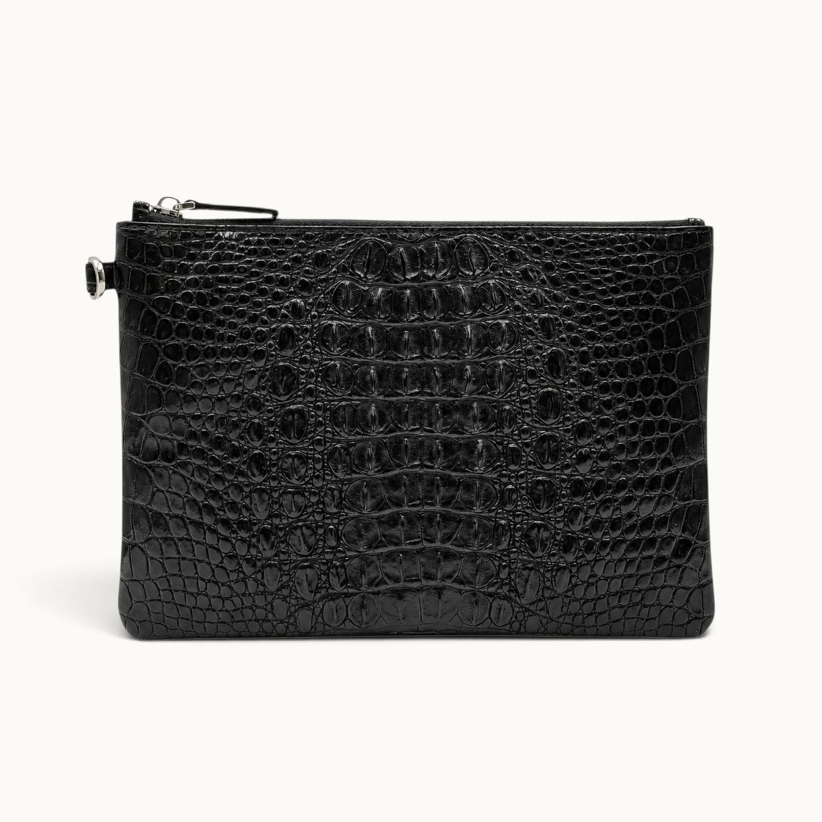 Classic black crocodile clutch bag with elegant natural scale pattern and streamlined silhouette
