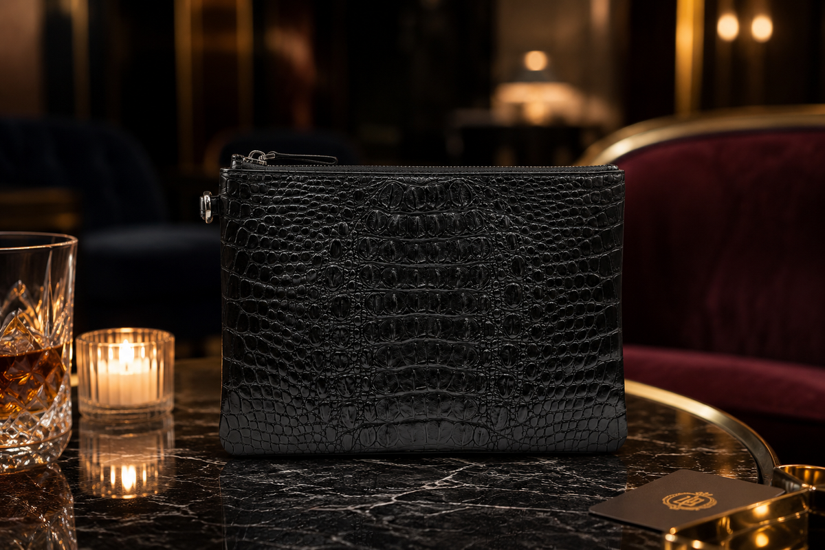 Classic black crocodile clutch on a marble table in an elegant hotel lounge evening setting