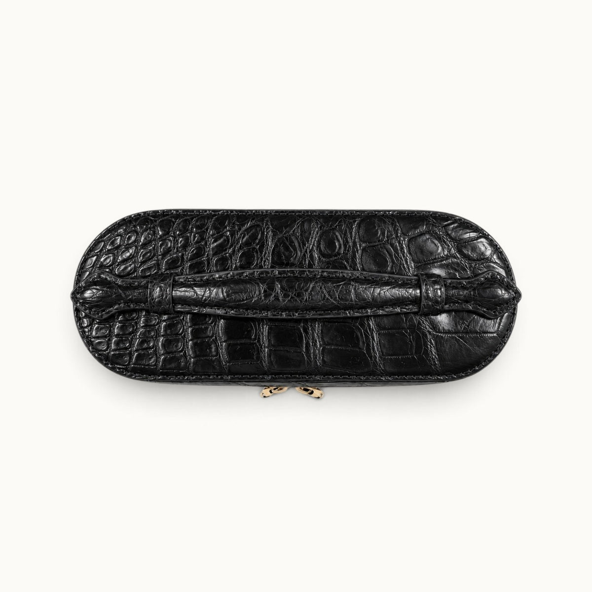 Top view of The Clarendon Classic Black crocodile vanity box bag with genuine crocodile handle and structured lid.