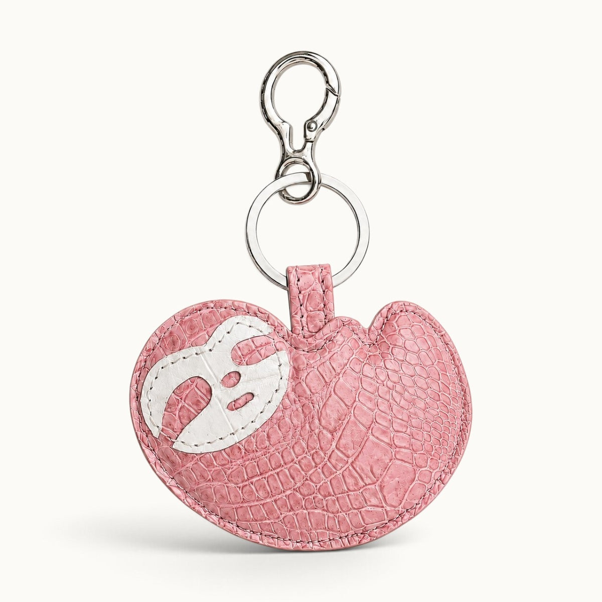 Blush Pink Crocodile Palette Bag Charm with white mask motif and polished silver-tone hardware