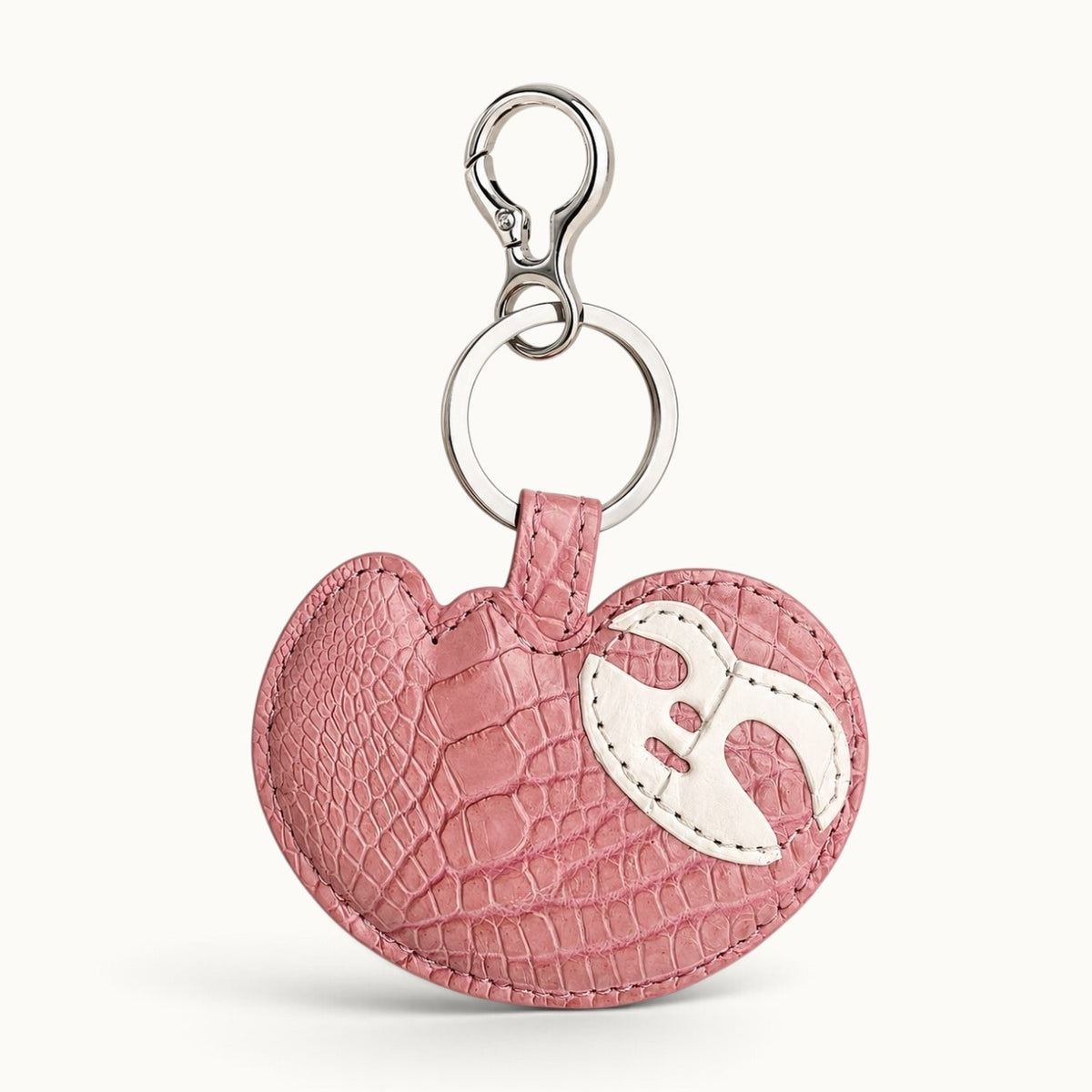 Blush Pink Crocodile Palette Bag Charm front view showing natural crocodile scale pattern and white mask motif