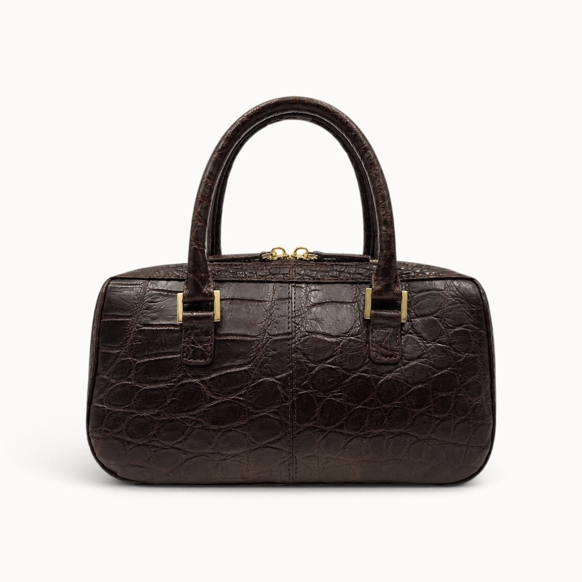 Espresso brown crocodile handbag back view with natural scale pattern and gold-tone handle hardware