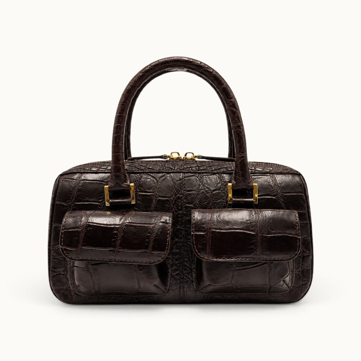 Espresso brown crocodile handbag front view with two structured exterior pockets and top handles