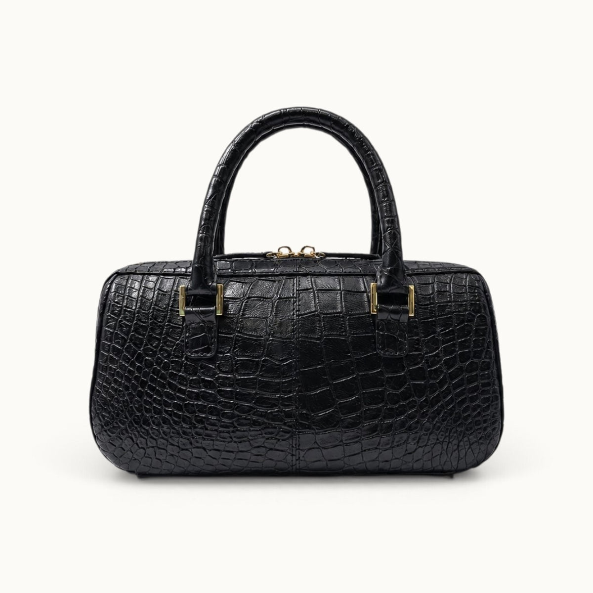 Back view of the Fairmont Siamese crocodile handbag in Classic Black highlighting the natural crocodile scale pattern and structured silhouette.