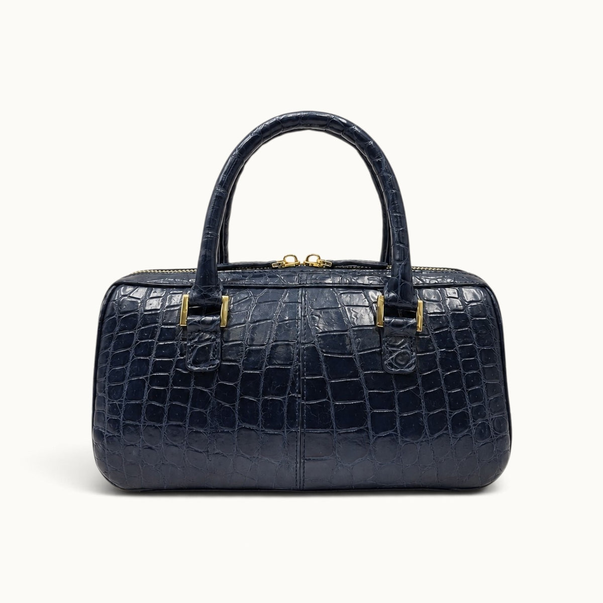 The Fairmont Crocodile Handbag in navy blue, back view showing clean structured design and crocodile leather texture.