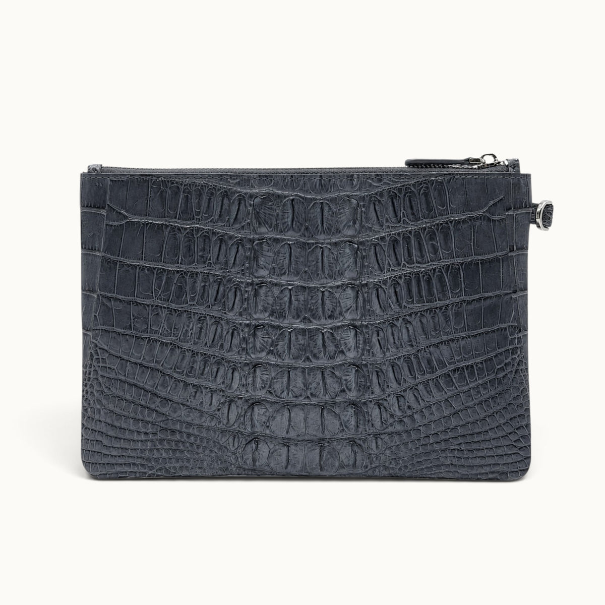 Luxury gray crocodile leather pouch showing the distinctive reverse scale pattern