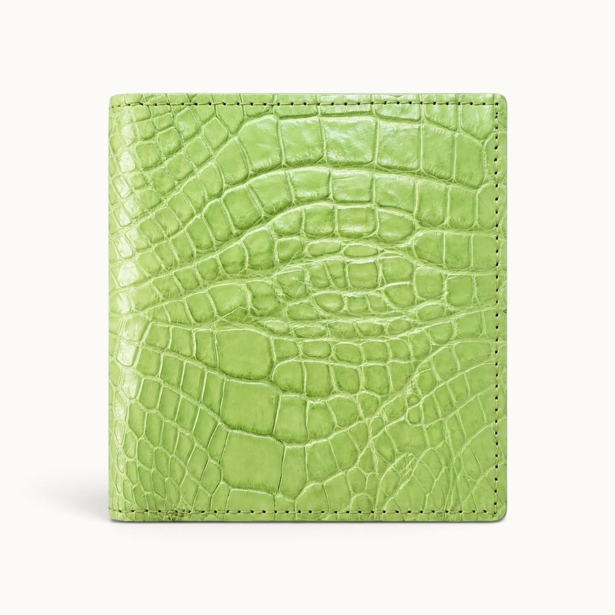 Herrington Lime Green trifold wallet crafted from genuine Siamese crocodile leather, shown in a clean front view with a bright natural scale pattern and precise stitching.