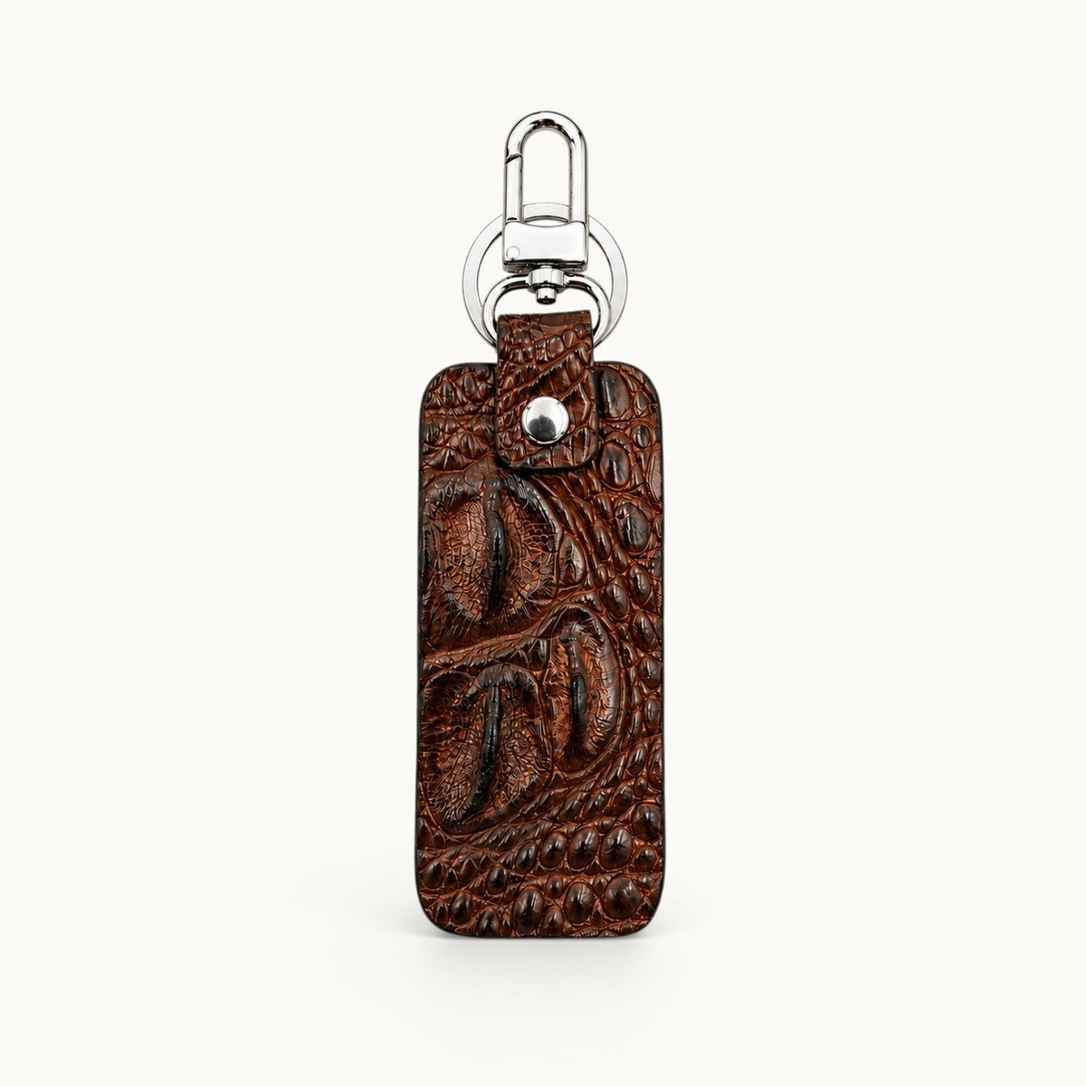 Front view of the Kensington brown genuine alligator leather key fob with polished silver-tone clasp and key ring.