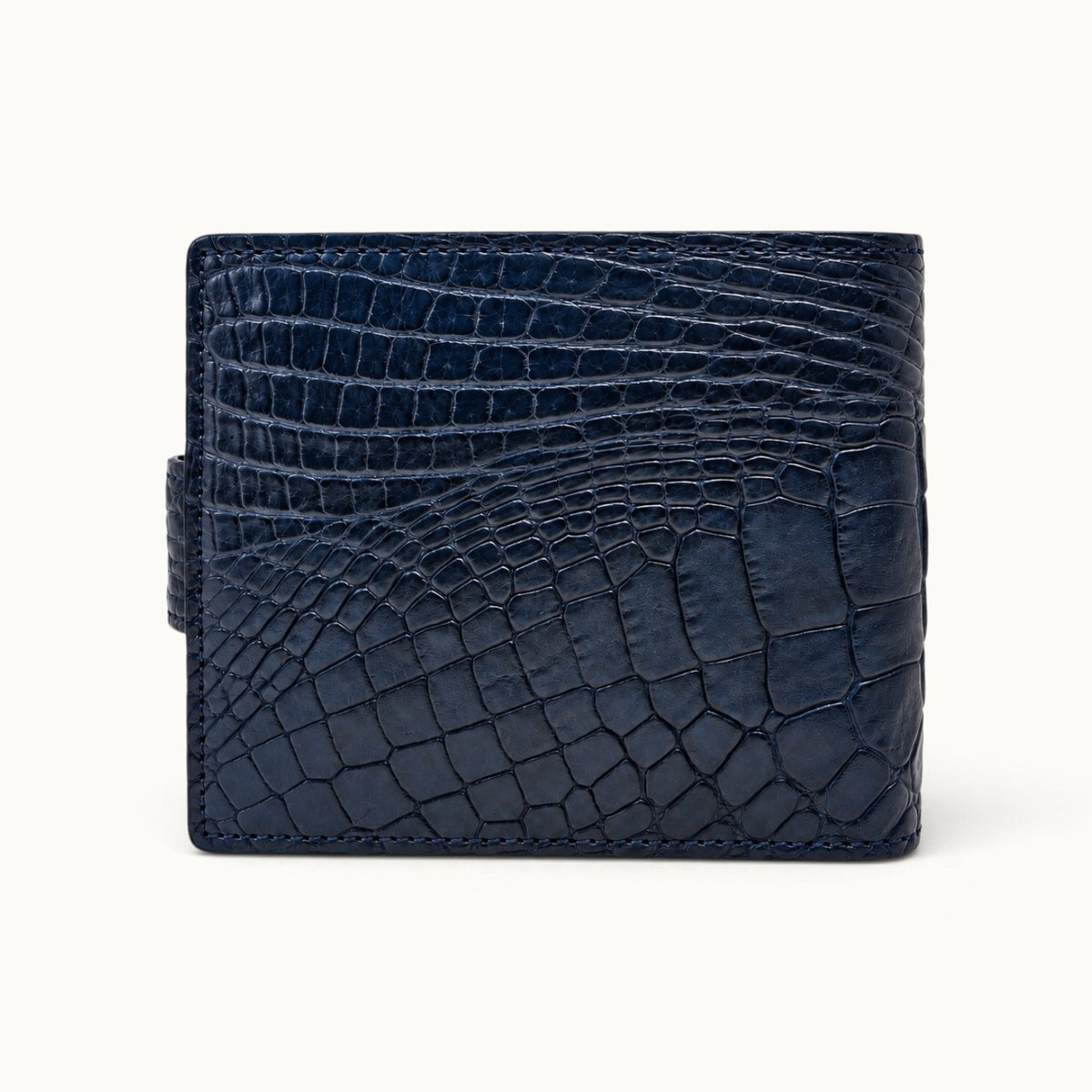 Deep navy Langham crocodile wallet back view showing natural crocodile scale pattern