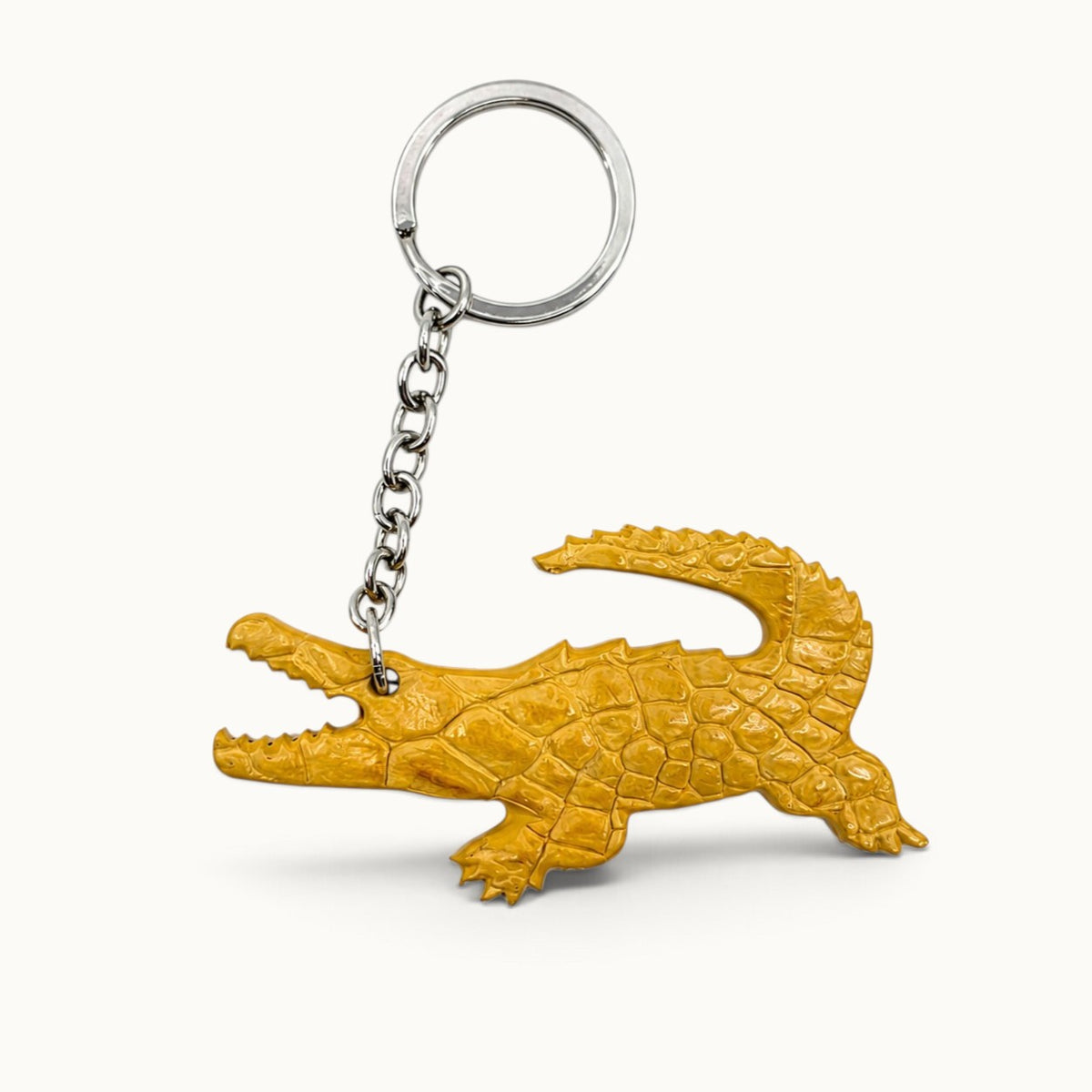 Mustard yellow Siamese crocodile leather key charm with silver-tone ring and chain