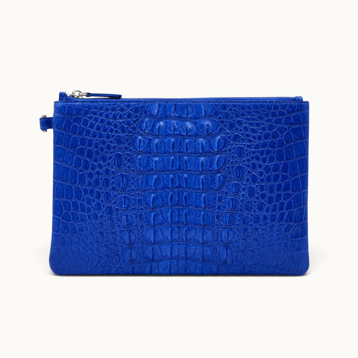 Royal blue crocodile leather clutch handcrafted with a distinctive natural scale pattern