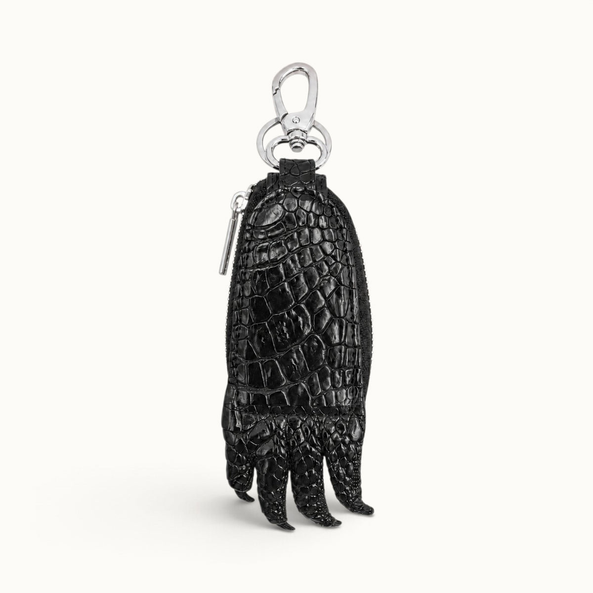 Black Siamensis crocodile leather car key case shown from the back with natural scale pattern, silver hardware, and sculpted claw detail.